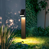Glass monocrystalline solar panel on top of the Strata Pro aluminum housing, lighting a planted garden bed after dark